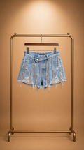 Pantalones cortos vaqueros de lujo con flecos